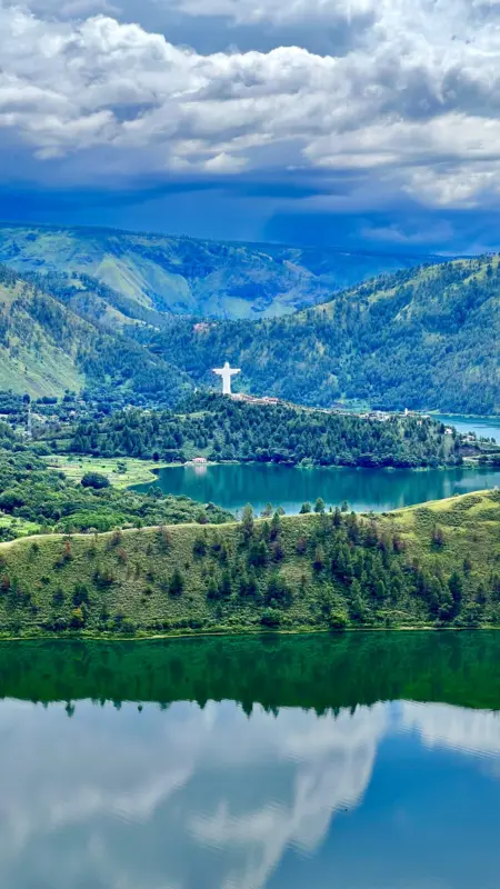 Stunning panoramic view of Lake Toba from Holbung Hills.